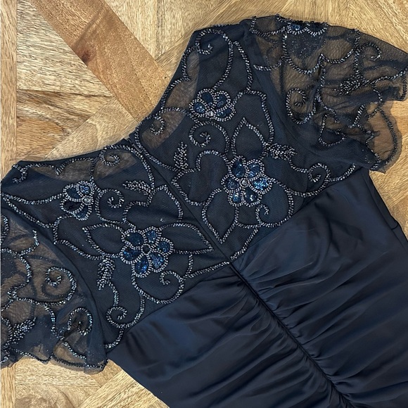 Elegant Navy Evening Gown with Beautiful Beaded Neckline and Flutter Sleeves - Picture 4 of 7